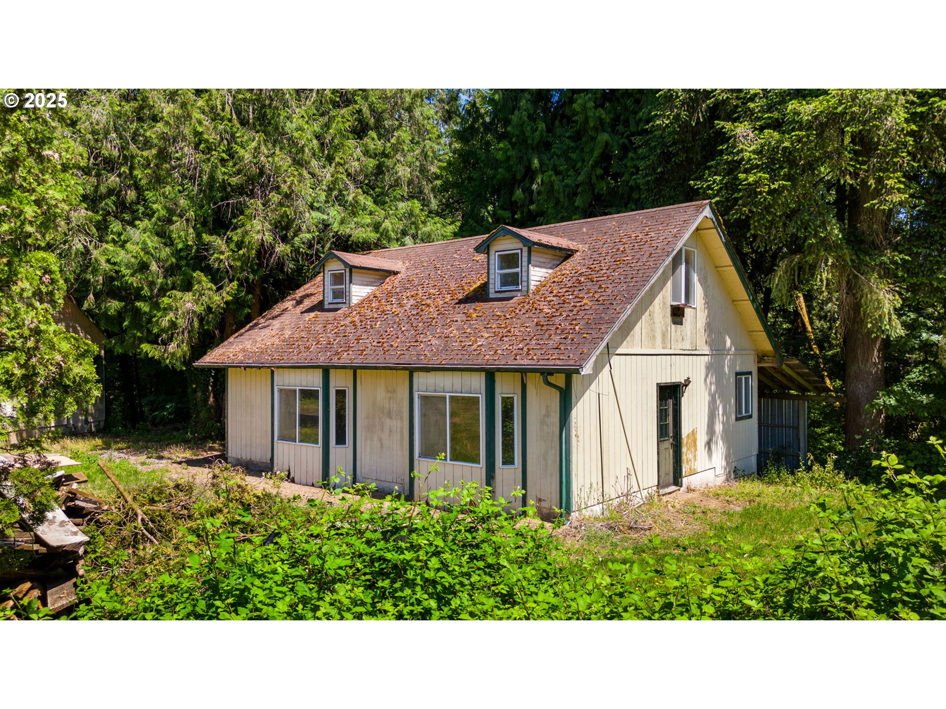 3411 Northeast 179th Street Ridgefield, WA 98642 - Photo 7 of 48 a view of a house with a backyard