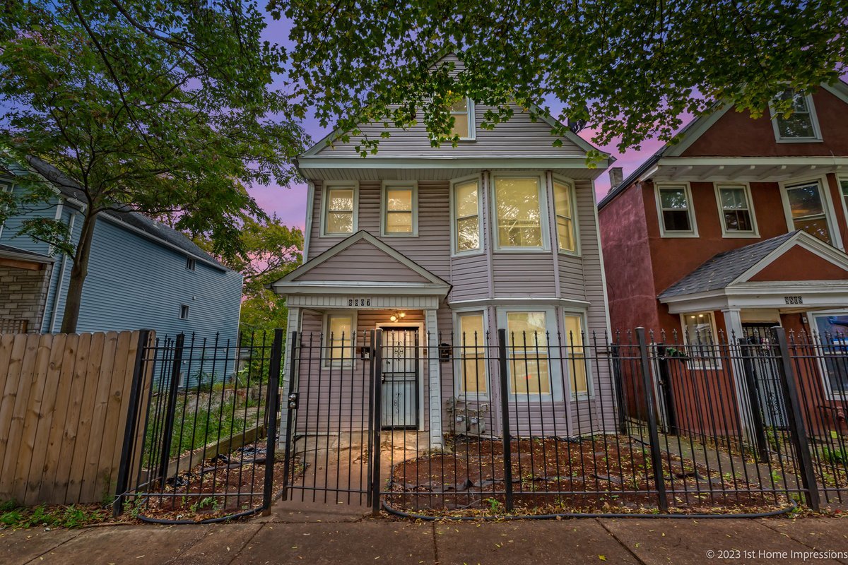8807 South Lowe Avenue Chicago, IL 60620 - Photo 1 of 19 a front view of a house