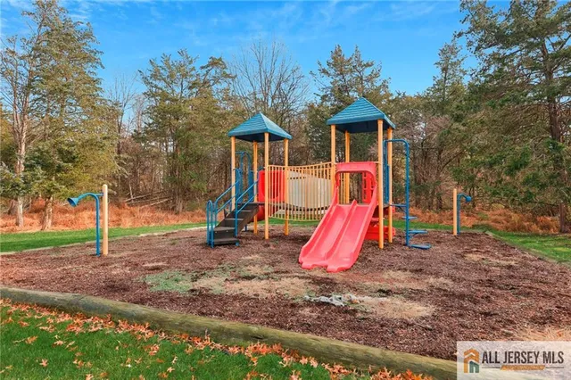 a view of a park with a slide