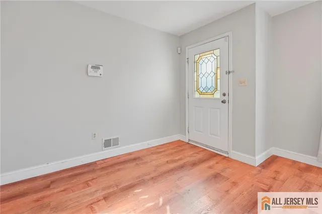 an empty room with window