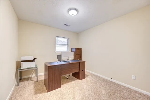 a workspace with a desk and chair