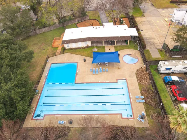 a view of swimming pool with seating area