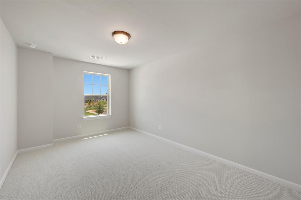 4308 Palomino Road Aubrey, TX 76227 - Photo 36 of 40 a view of an empty room with a window