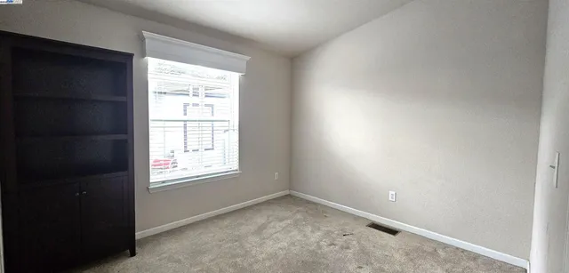 an empty room with a window