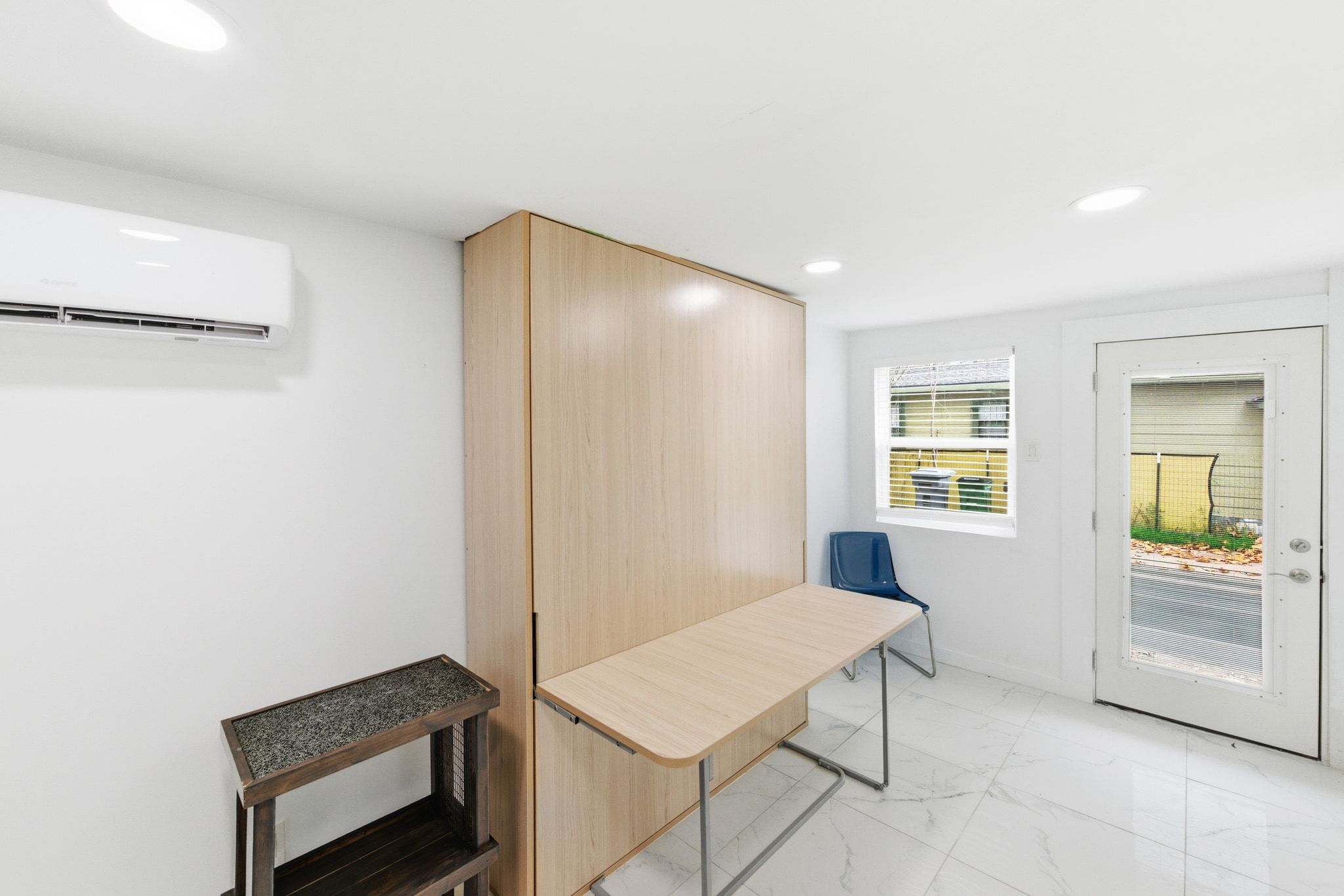 1706 Riverview Street, Unit A Austin, TX 78702 - Photo 14 of 23 a room with furniture and a window