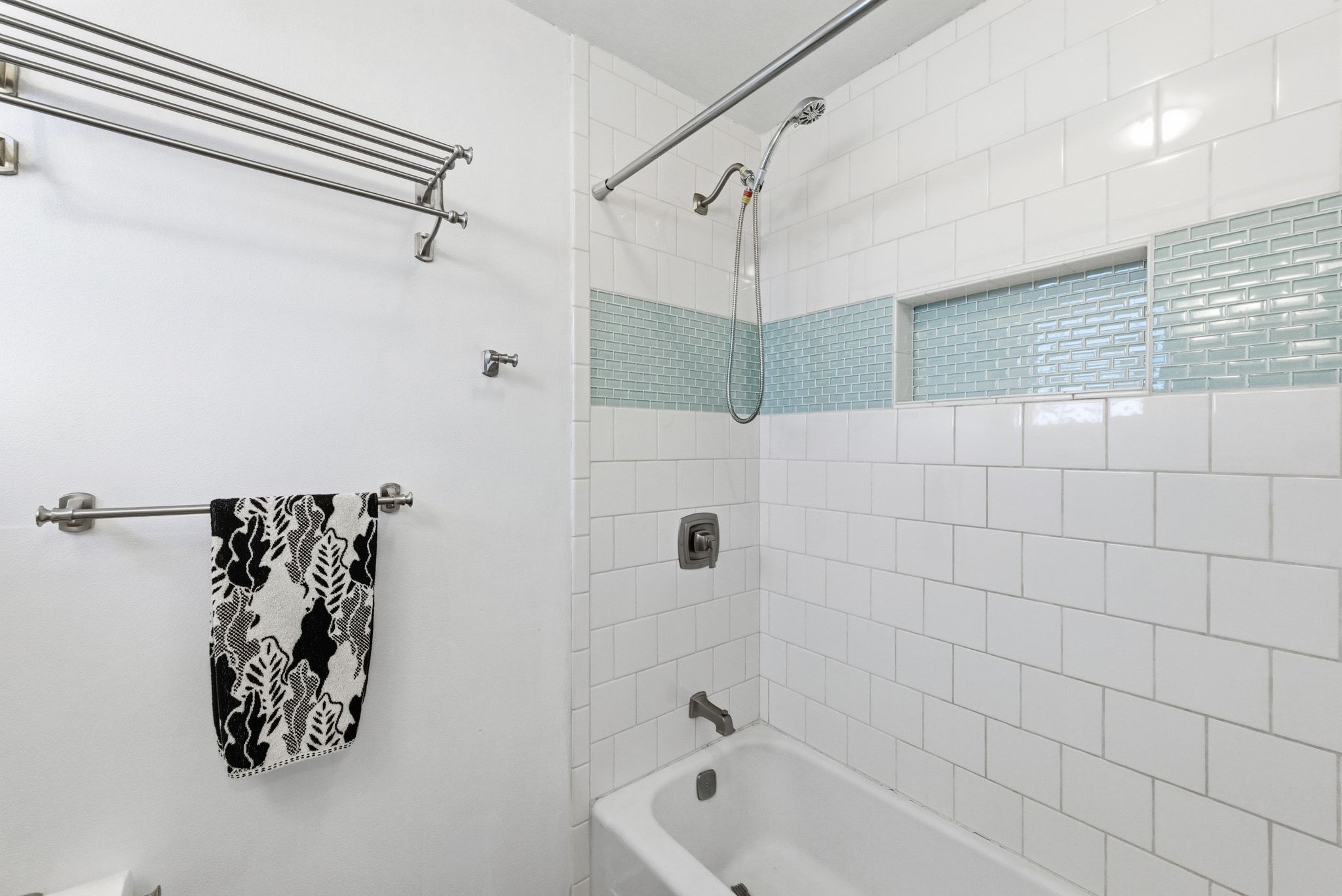 1706 Riverview Street, Unit A Austin, TX 78702 - Photo 18 of 23 a bathroom with a bathtub and shower