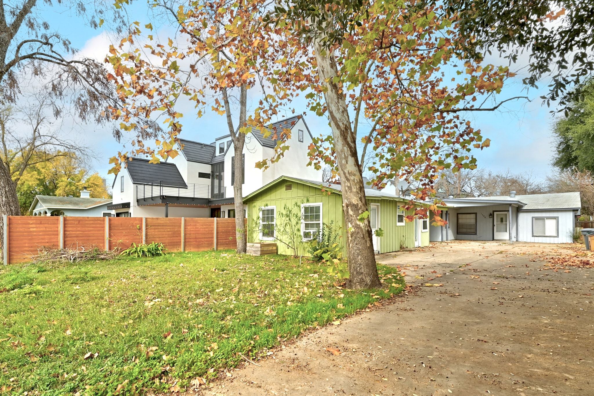 1706 Riverview Street, Unit A Austin, TX 78702 - Photo 22 of 23 front view of a house with a yard