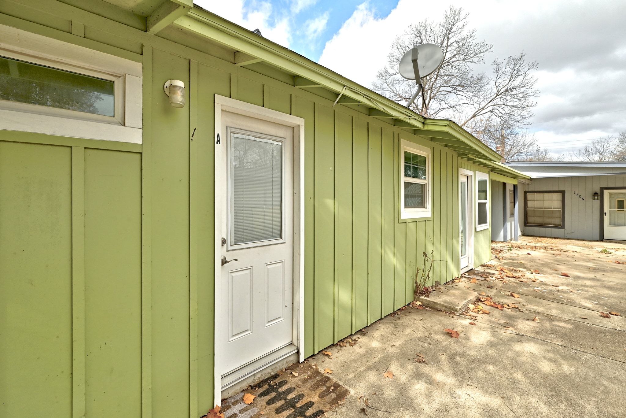 1706 Riverview Street, Unit A Austin, TX 78702 - Photo 23 of 23 a view of a house with a wooden fence