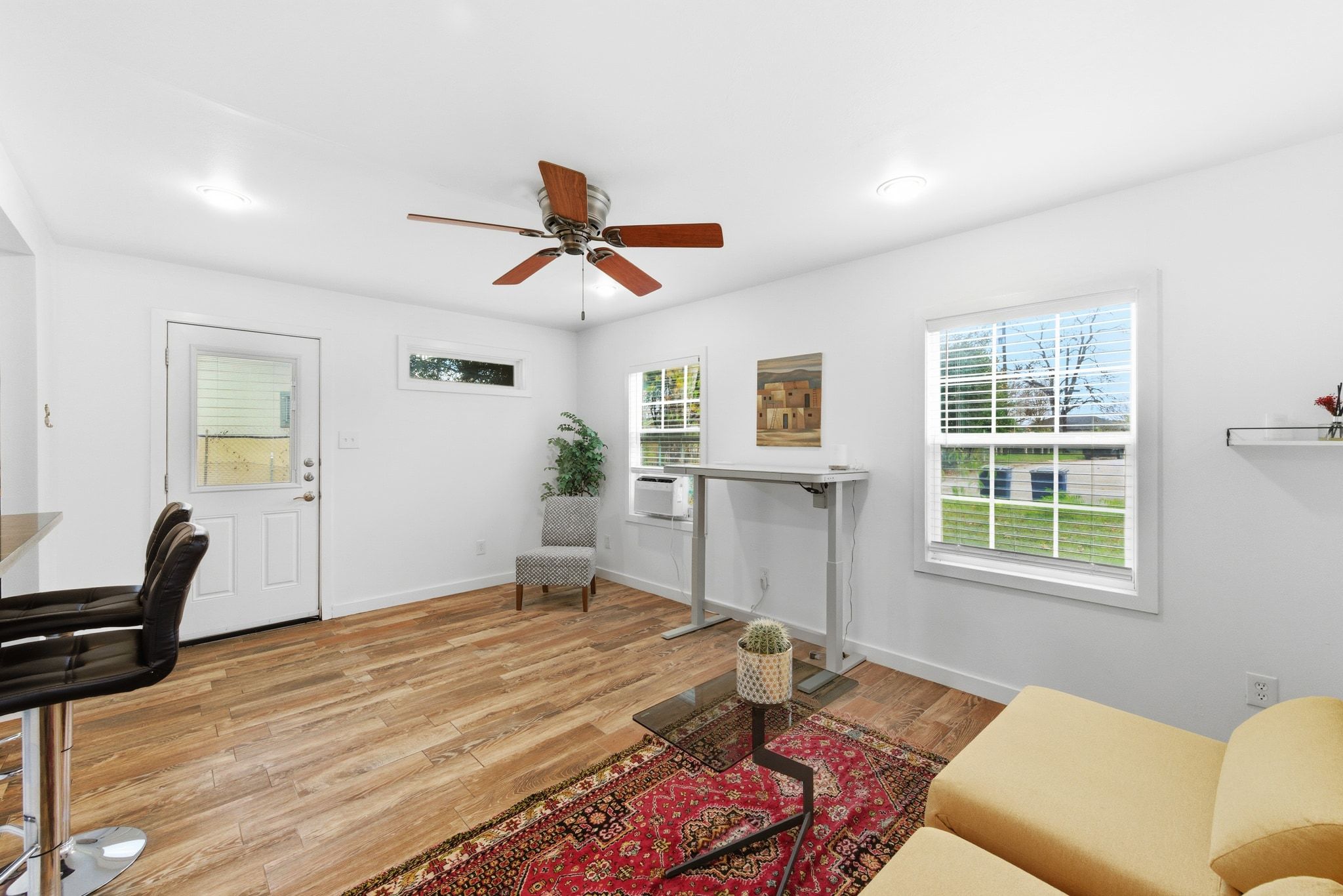 1706 Riverview Street, Unit A Austin, TX 78702 - Photo 4 of 23 a bedroom with a bed furniture and a window