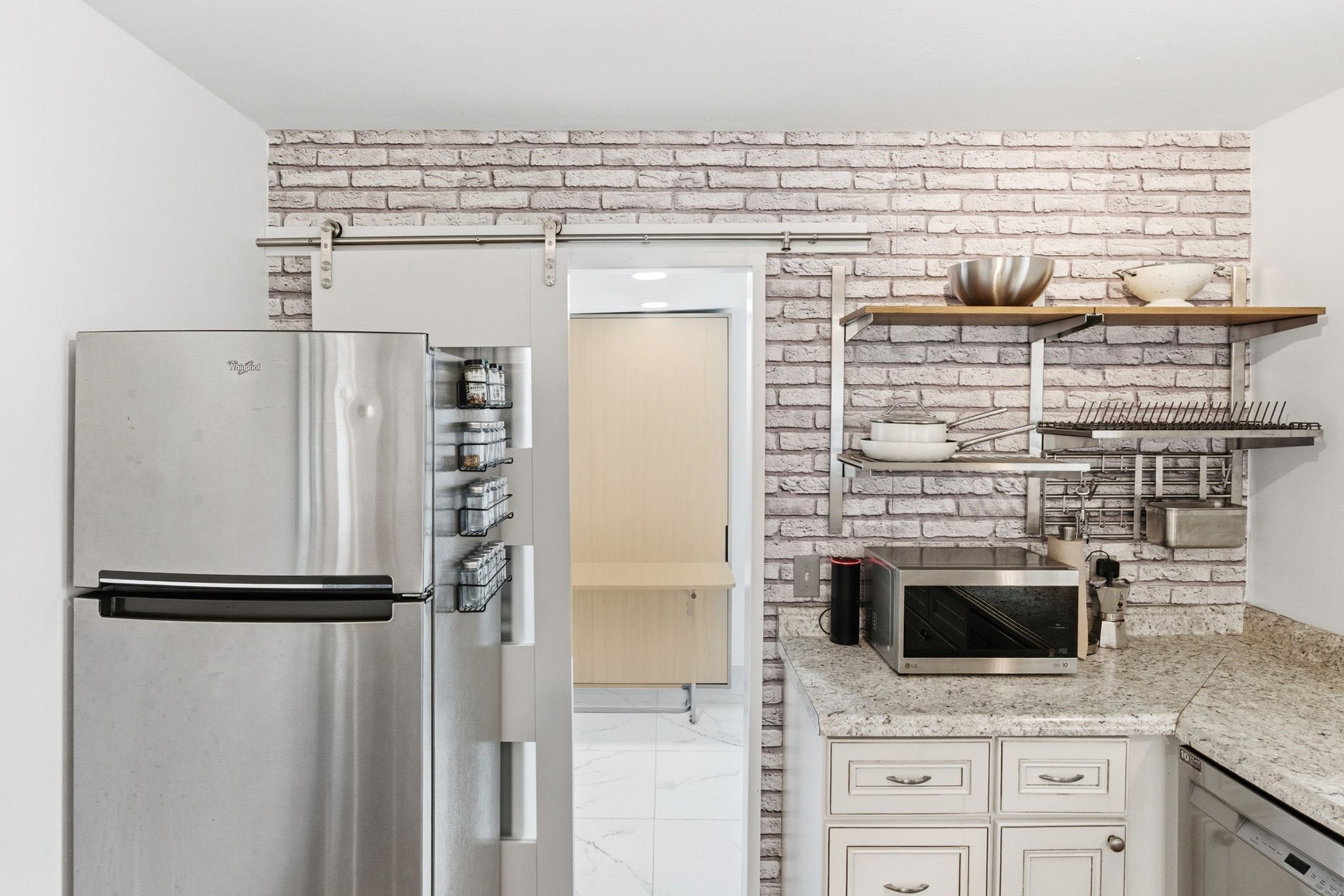1706 Riverview Street, Unit A Austin, TX 78702 - Photo 9 of 23 a kitchen with a refrigerator and a stove