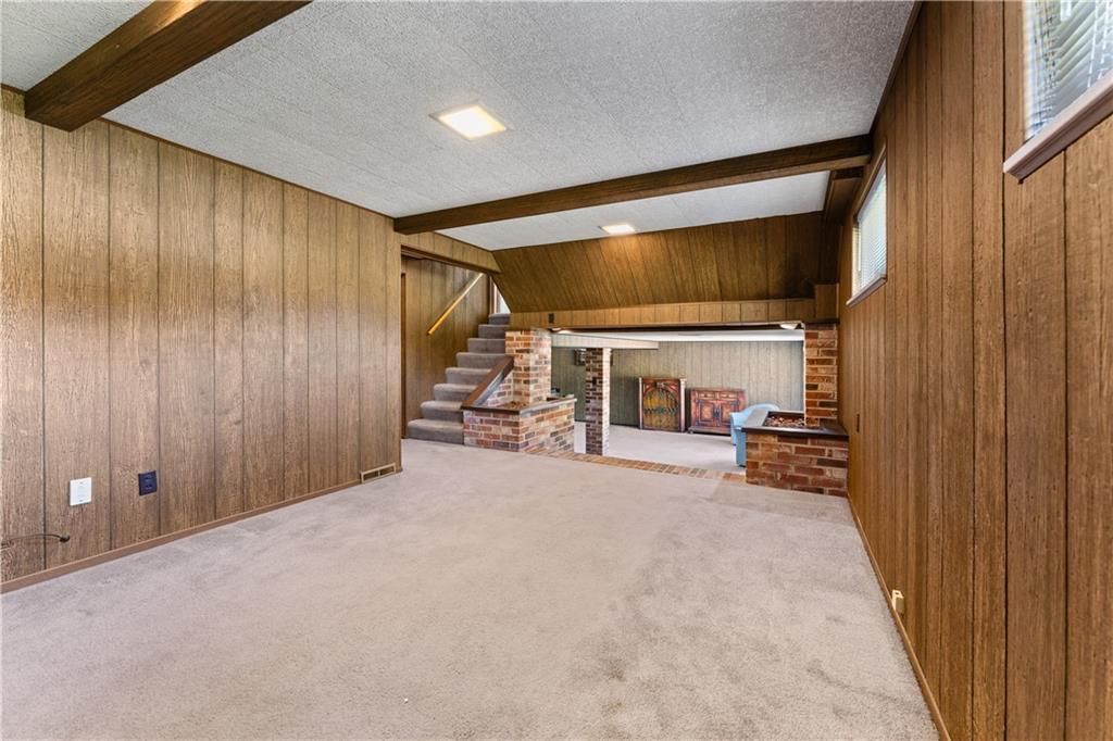 20 McCarrell Road Hickory, PA 15340 - Photo 22 of 35 Huge family room and game room with entry from this level.