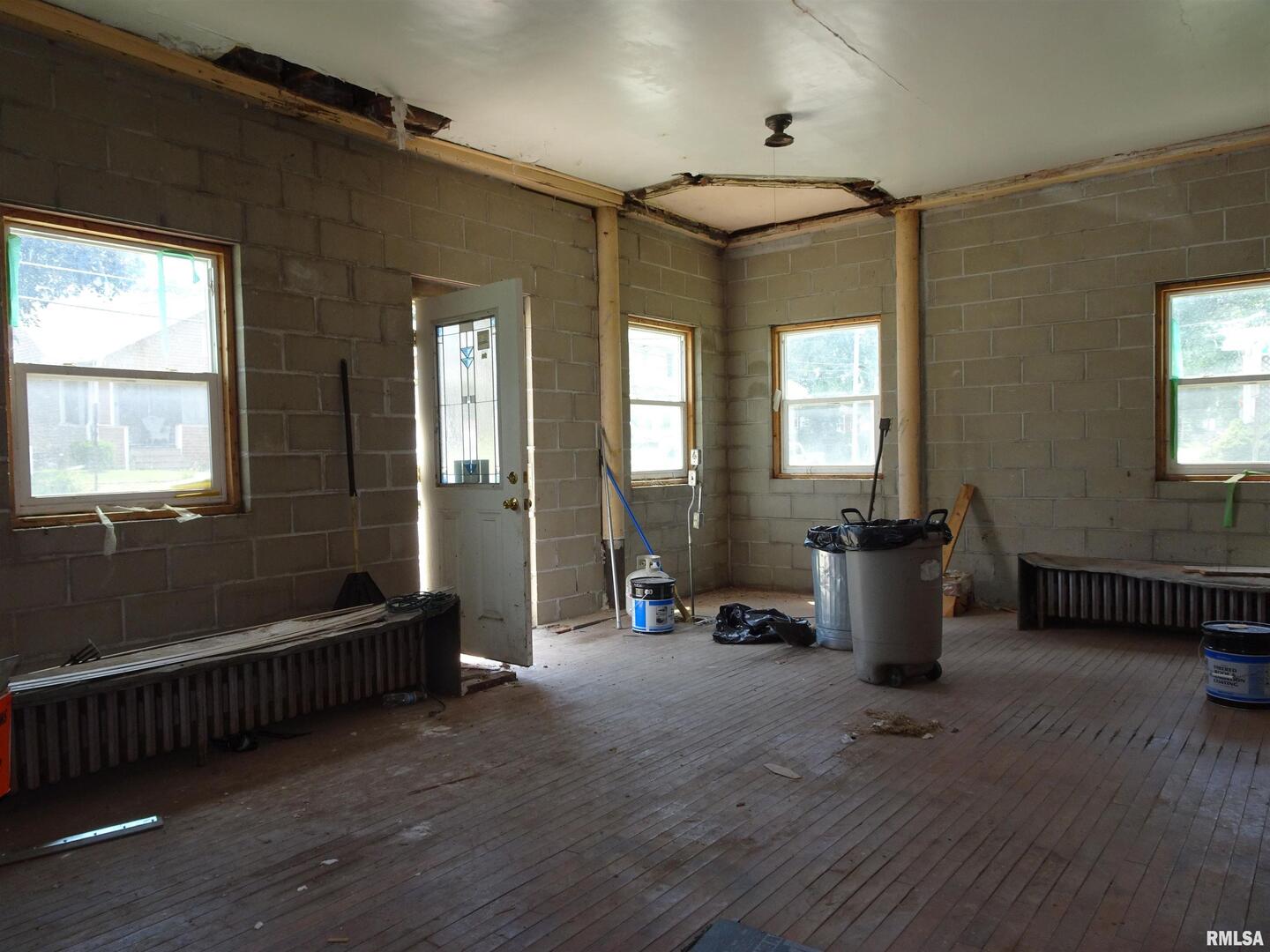 1930 9th Street Rock Island, IL 61201 - Photo 15 of 17 a living room with furniture and a window