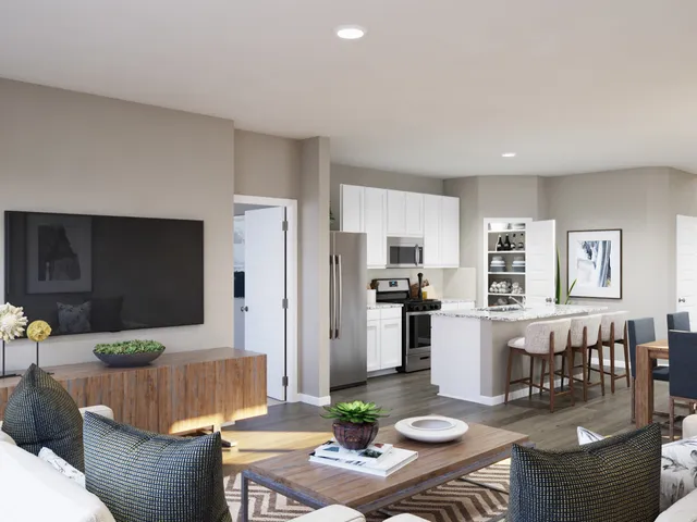 a bathroom with a shower and a room