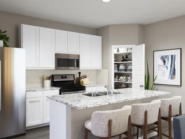 a bedroom with a large bed and a large window