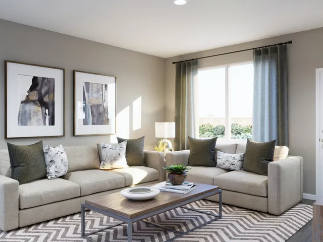 a bathroom with a granite countertop sink mirror vanity and toilet