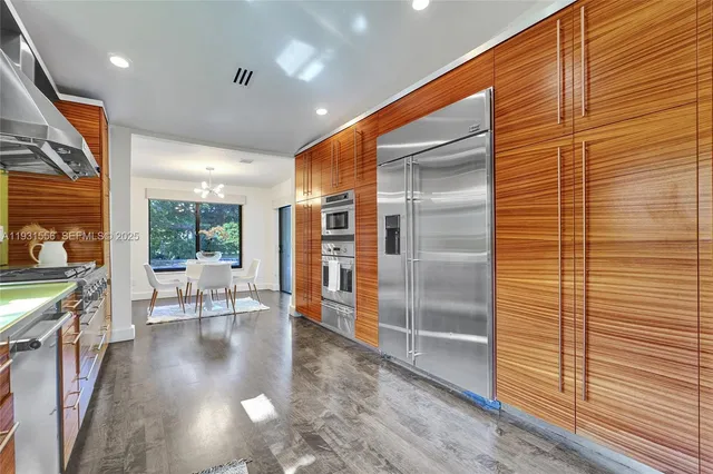 a bathroom with a sink a toilet and vanity
