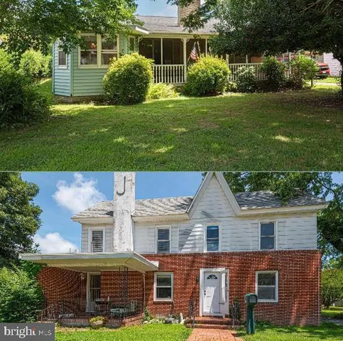 front view of a house next to a yard