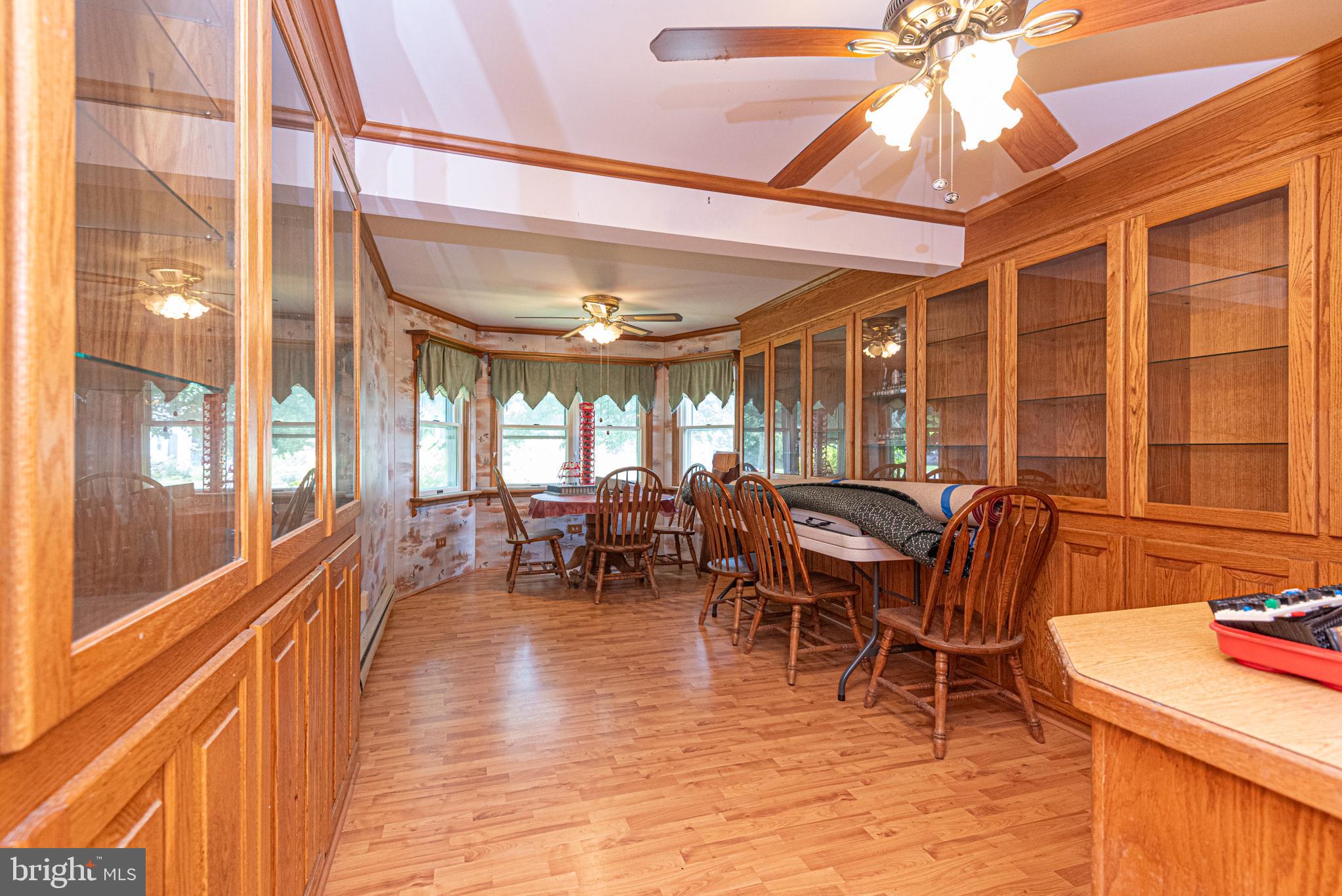 17 Burley Street Berlin, MD 21811 - Photo 12 of 150 a view of a dining room with furniture window and wooden floor
