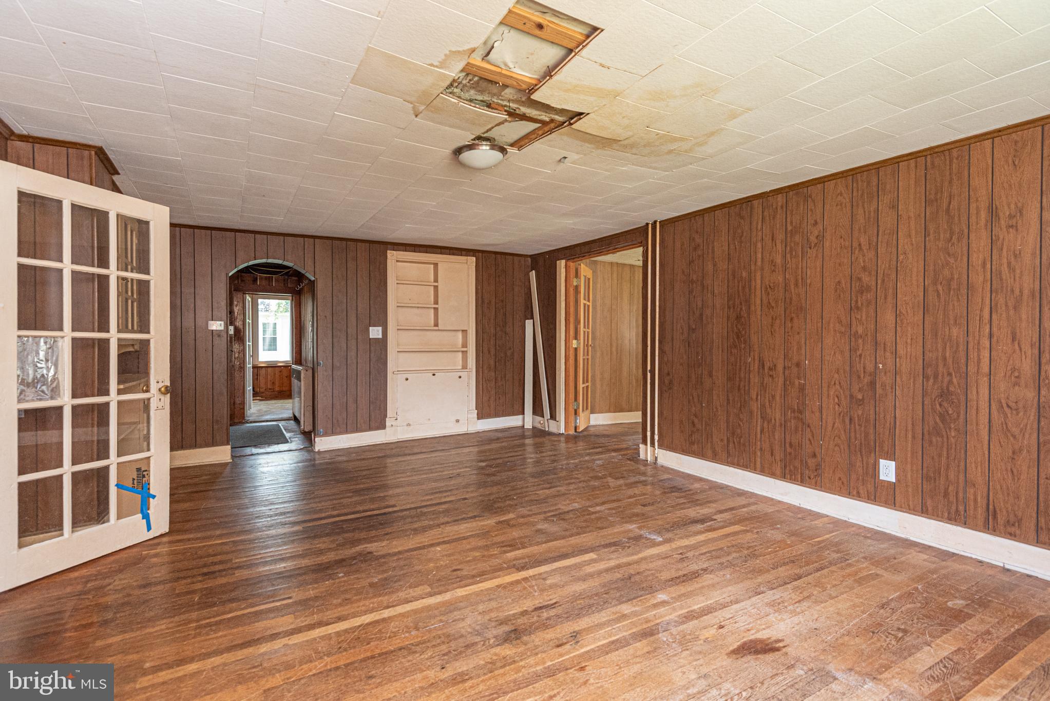 17 Burley Street Berlin, MD 21811 - Photo 143 of 150 a view of empty room with wooden floor and fan