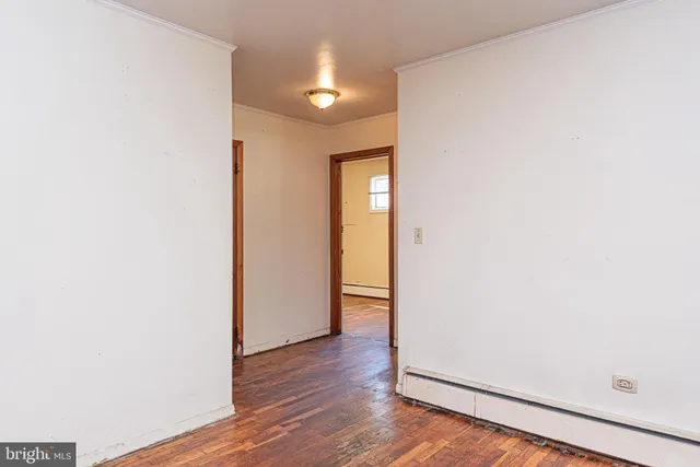 a backyard of a house with lots of green space and fountain view