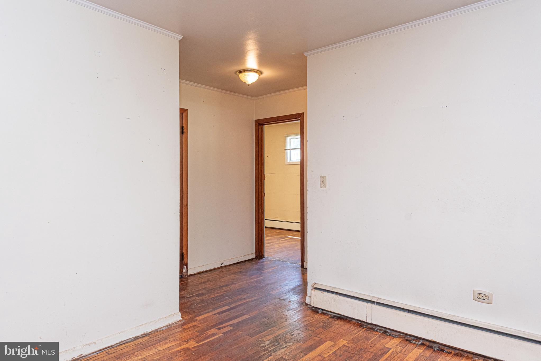 17 Burley Street Berlin, MD 21811 - Photo 20 of 150 a view of a hallway with wooden floor