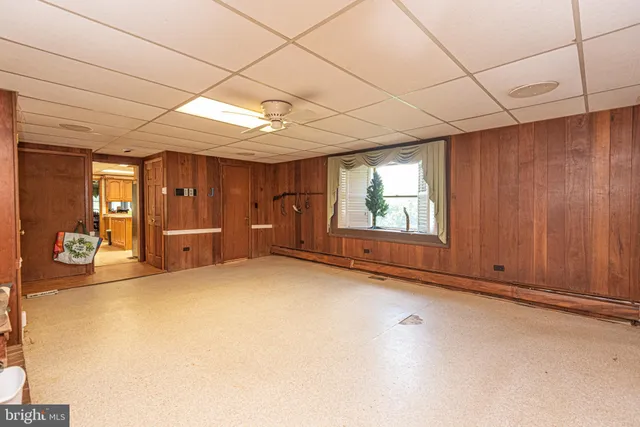 a view of a wooden deck with a bench