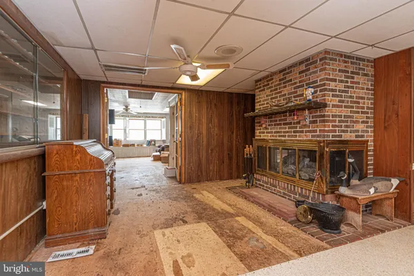 an aerial view of house with yard