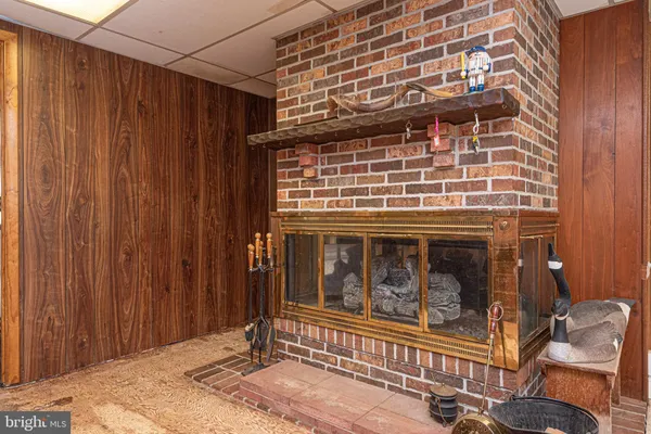 an aerial view of residential house with outdoor space and street view