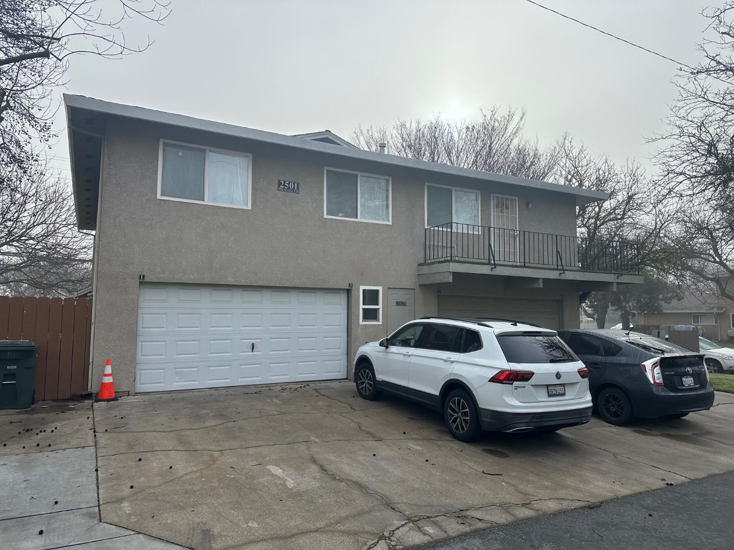 2501 Prescott Road Modesto, CA 95350 - Photo 5 of 8 a car parked in front of a house