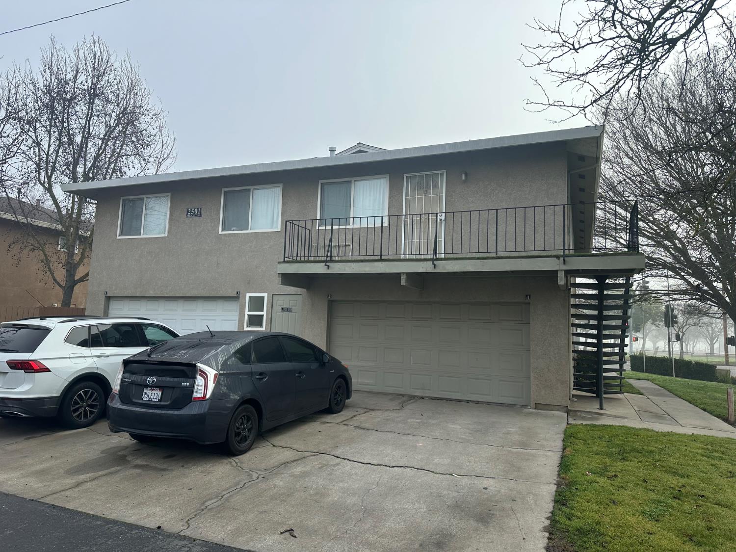 2501 Prescott Road Modesto, CA 95350 - Photo 6 of 8 a front view of a house with parking space