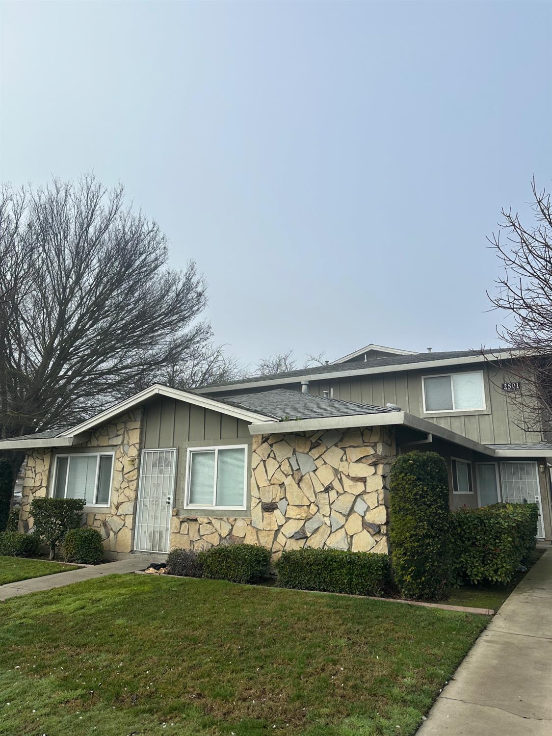 2501 Prescott Road Modesto, CA 95350 - Photo 8 of 8 a front view of a house with a yard