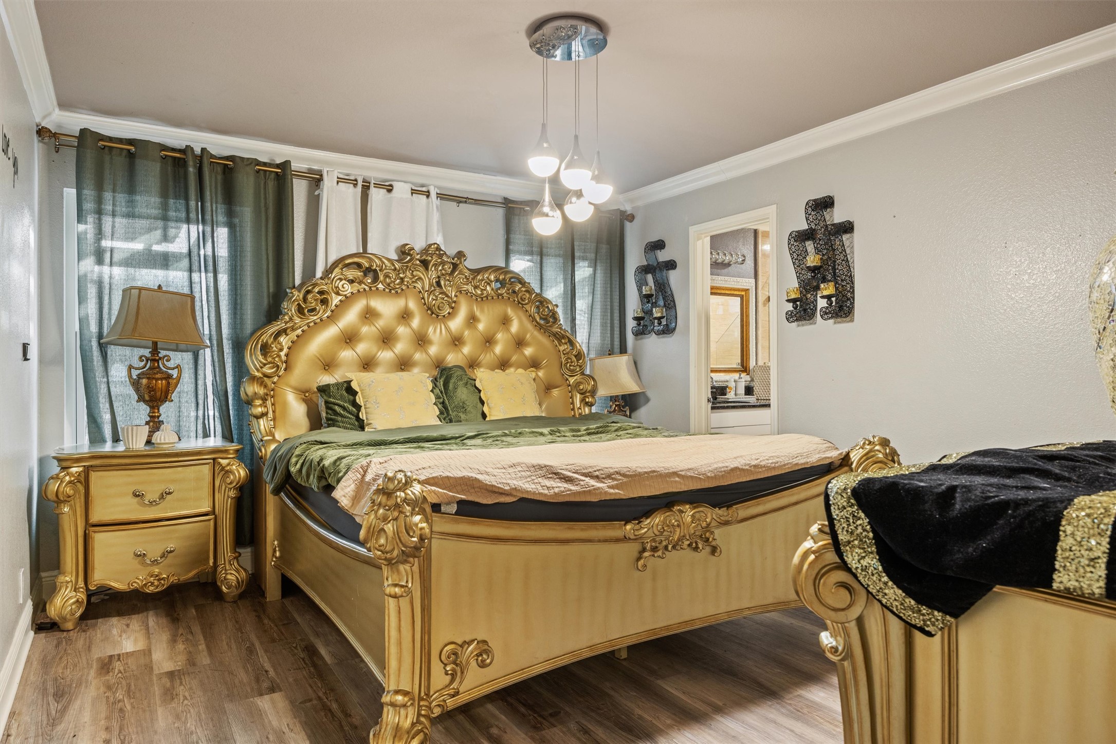 14409 Sandifer Street Austin, TX 78725 - Photo 7 of 31 Bedroom featuring crown molding and wood finished floors