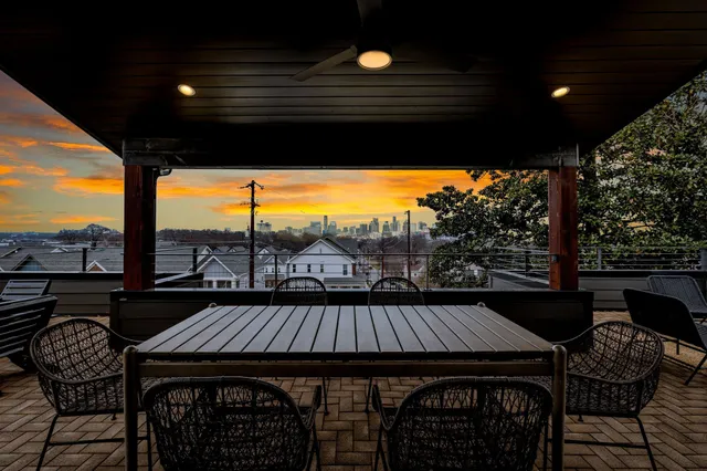 a view of balcony with furniture