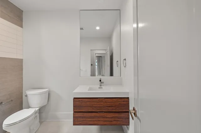 a view of a livingroom with furniture and wooden floor