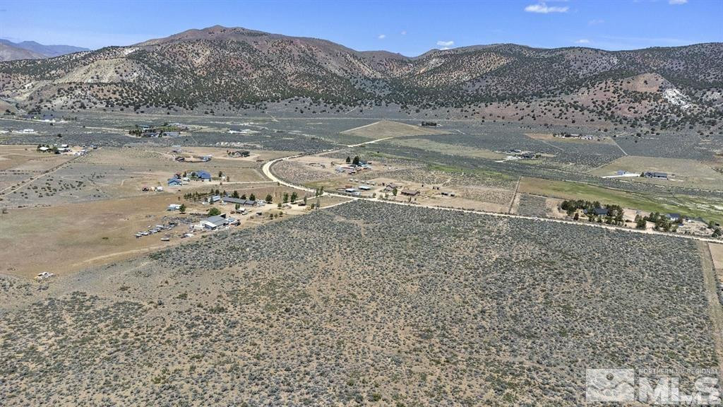 0 North Red Rock Road Reno, NV 89508 - Photo 2 of 15 a view of a large body of water with a mountain in the background