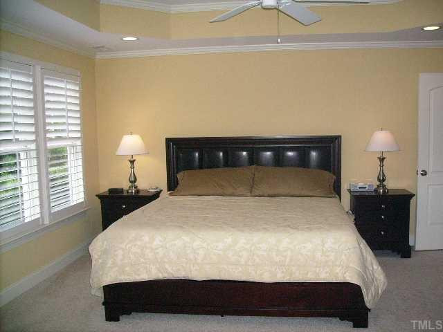 12240 Beestone Lane Raleigh, NC 27614 - Photo 9 of 12 WONDERFUL OWNER RETREAT W/FABULOUS WALKIN CLOSET, TREYED CEILING W/FAN, PLANTATION SHUTTERS! Master Bedroom