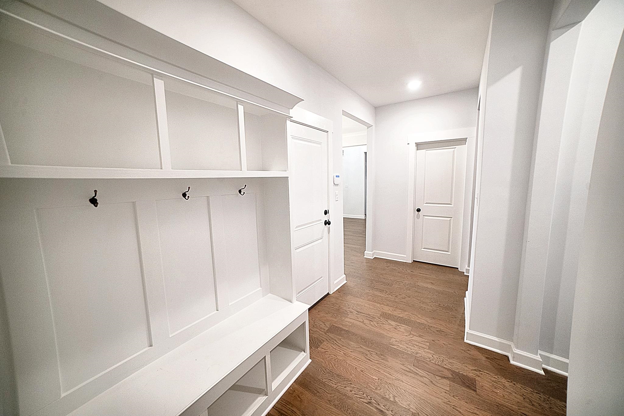 6398 Sallows Cove Bartlett, TN 38135 - Photo 11 of 31 a view of hallway with wooden floor