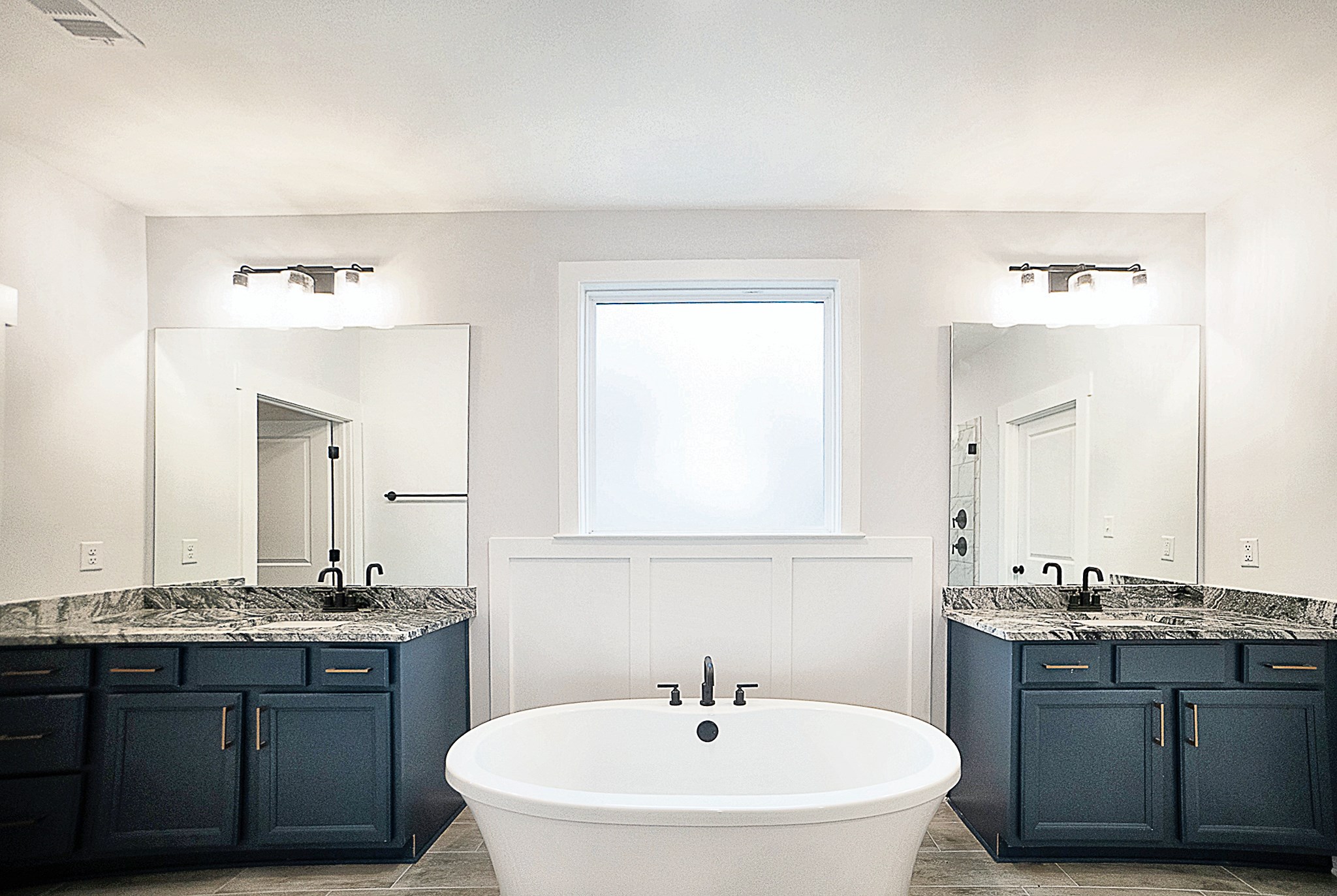 6398 Sallows Cove Bartlett, TN 38135 - Photo 14 of 31 a bathroom with a granite countertop sink and a mirror