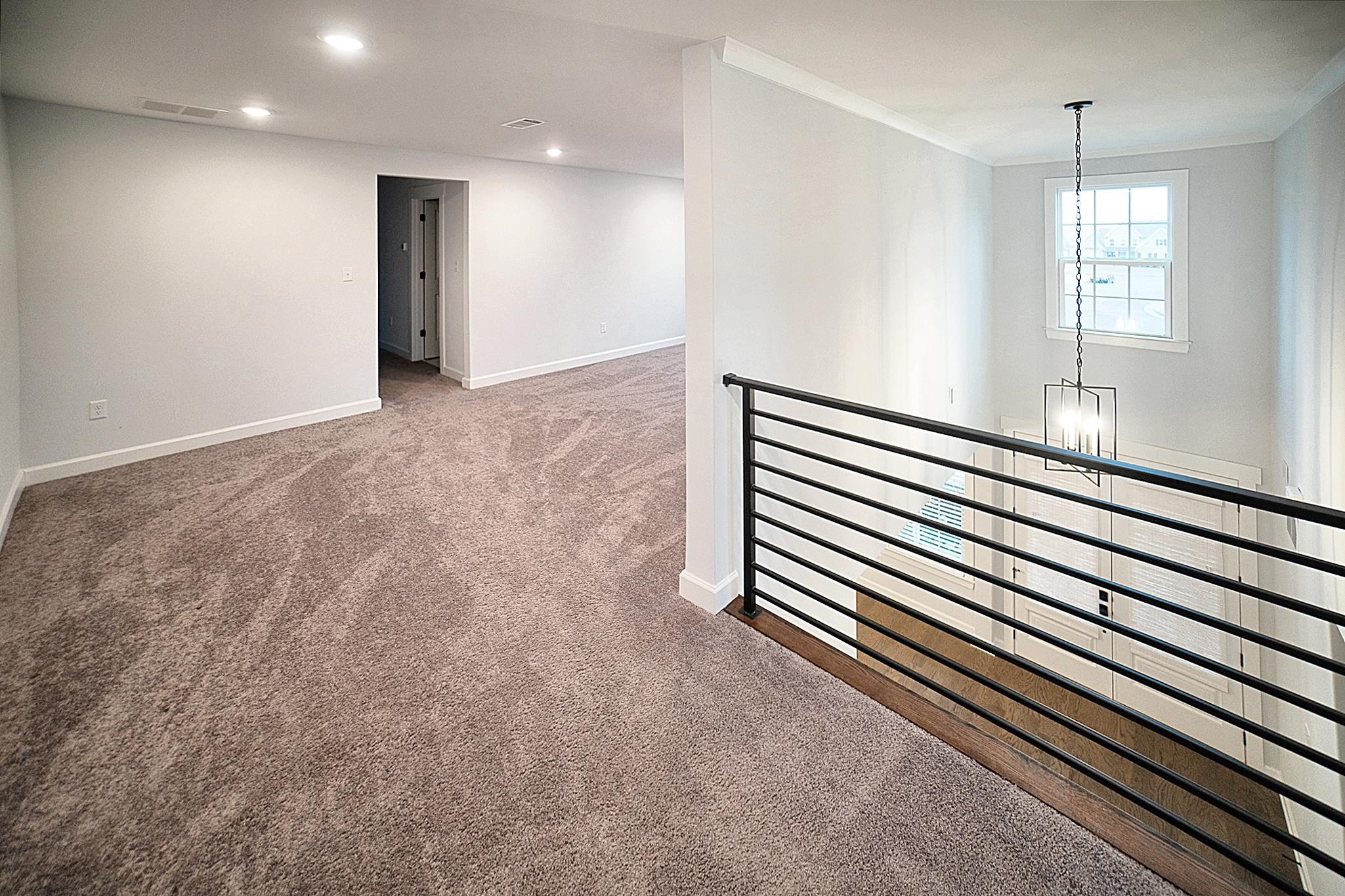 6398 Sallows Cove Bartlett, TN 38135 - Photo 18 of 31 a view of a room with wooden floor