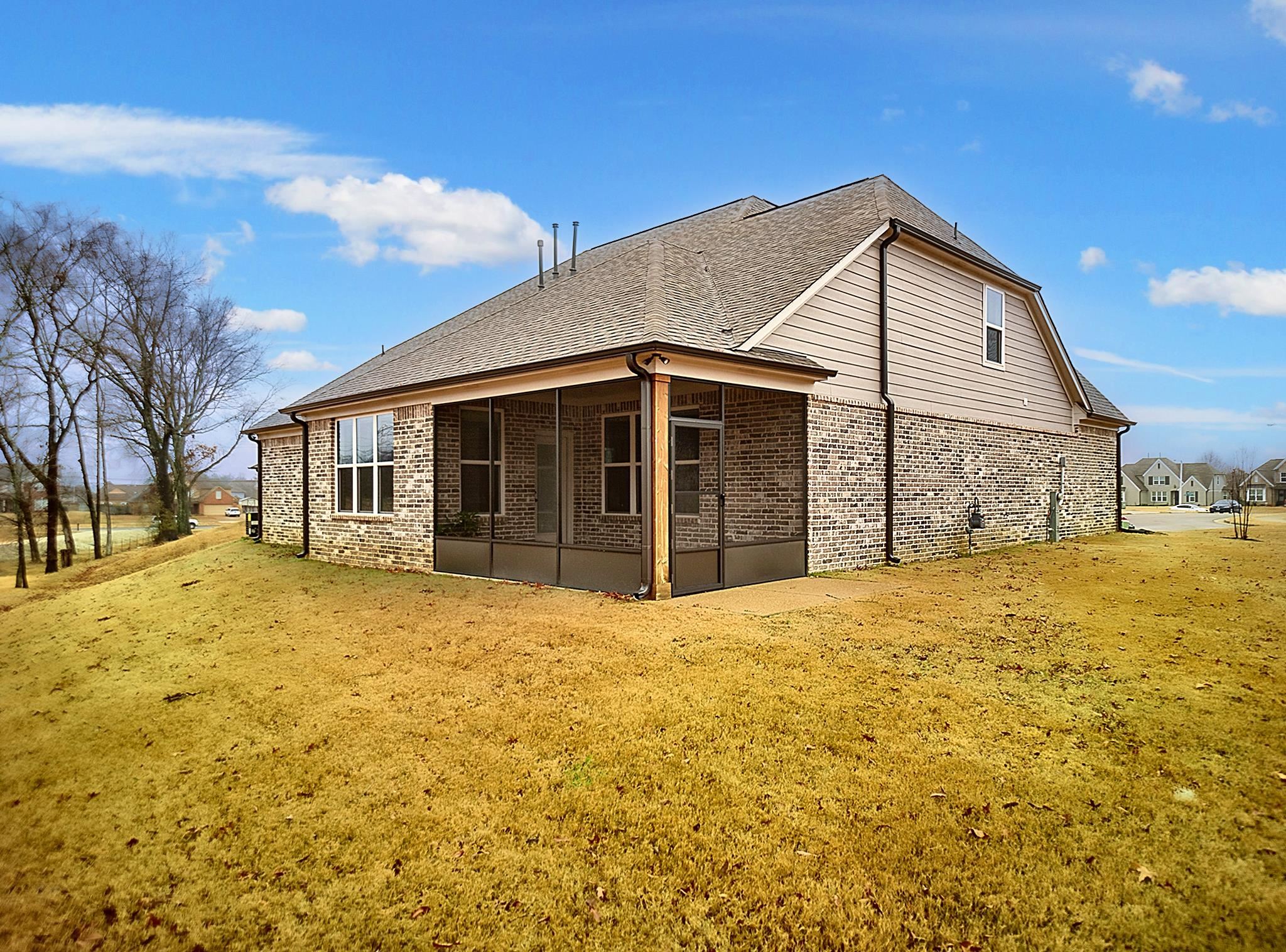 6398 Sallows Cove Bartlett, TN 38135 - Photo 26 of 31 a house with trees in front of it
