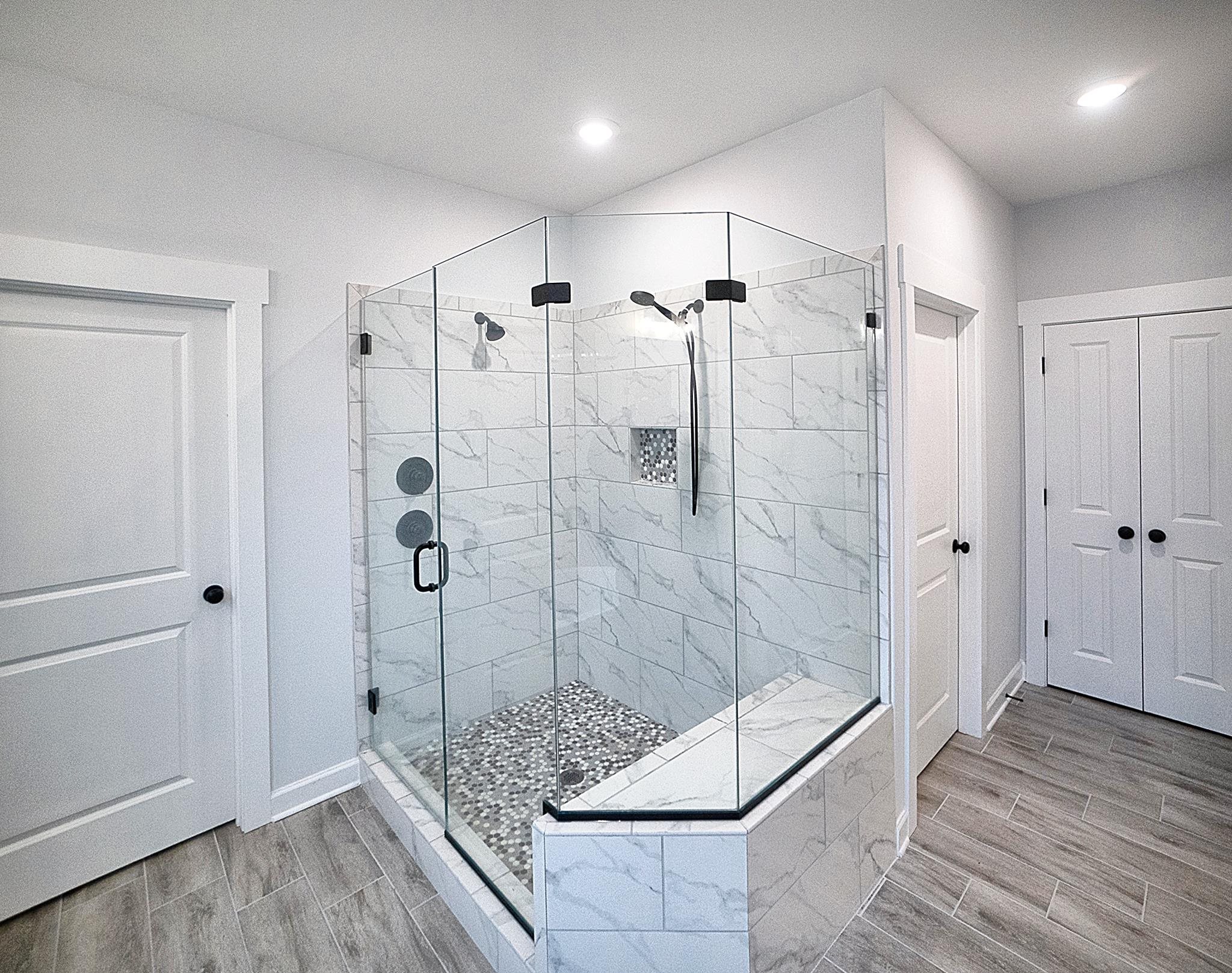 6398 Sallows Cove Bartlett, TN 38135 - Photo 10 of 31 a bathroom with a shower and a sink
