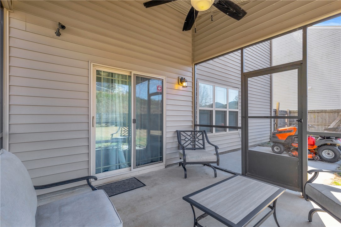 347 Riverdale Road Simpsonville, SC 29680 - Photo 21 of 30 Enjoy the outdoors from this inviting patio with easy access to the yard.