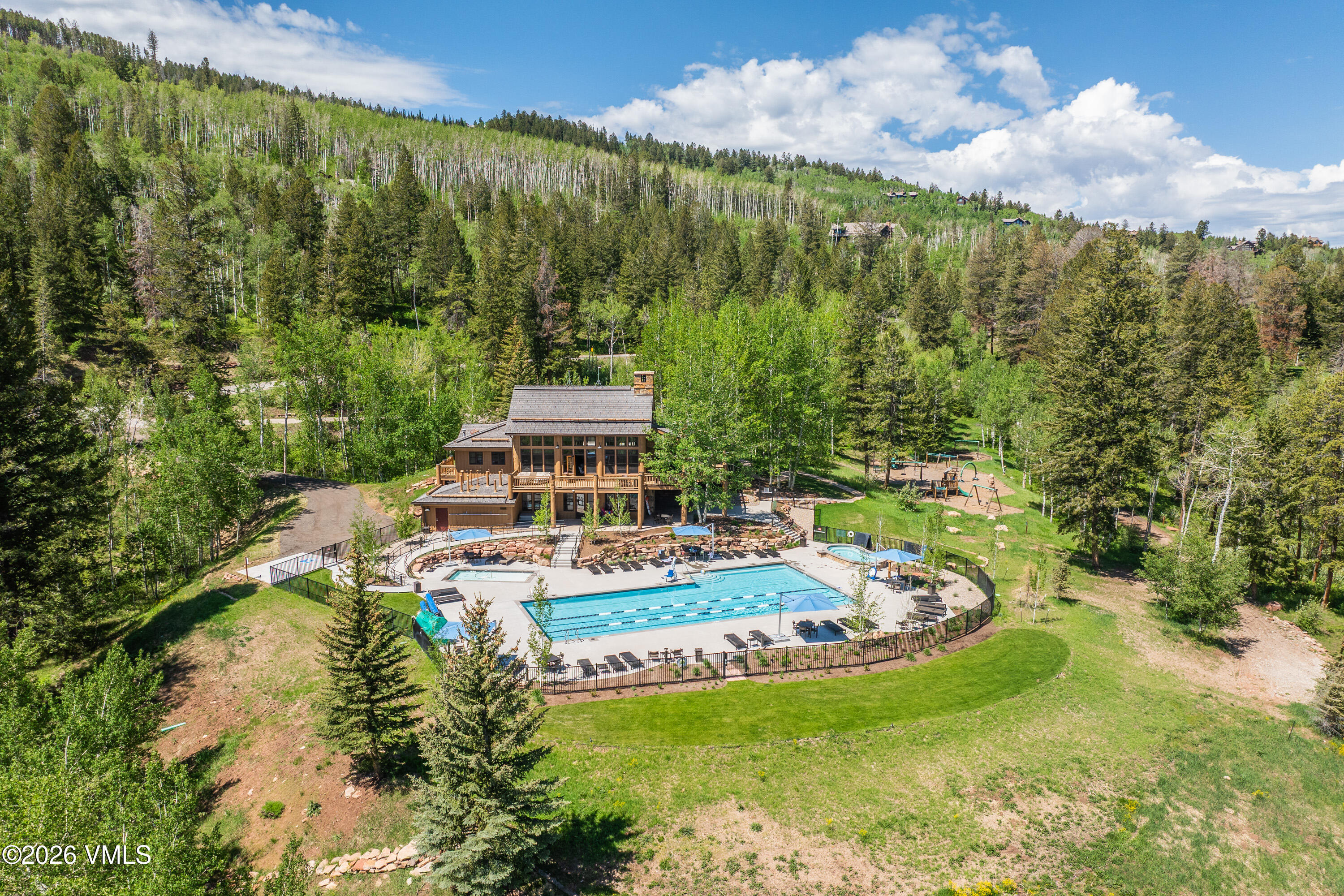 500 Little Andorra Road Edwards, CO 81632 - Photo 14 of 14 a view of a swimming pool with a yard