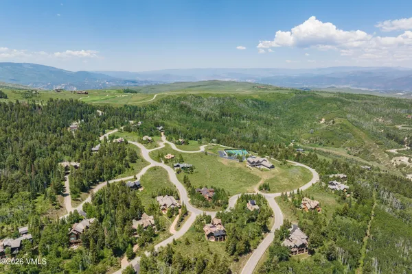 a view of a lake with a yard