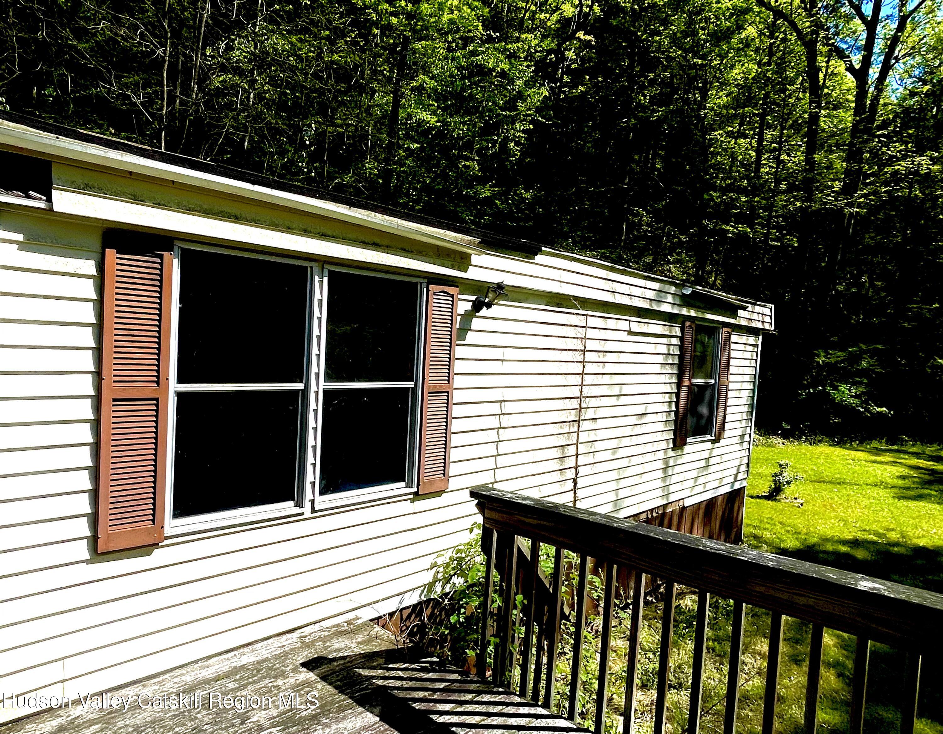 75 Tool House Road Catskill, NY 12414 - Photo 7 of 10 a view of a balcony with yard