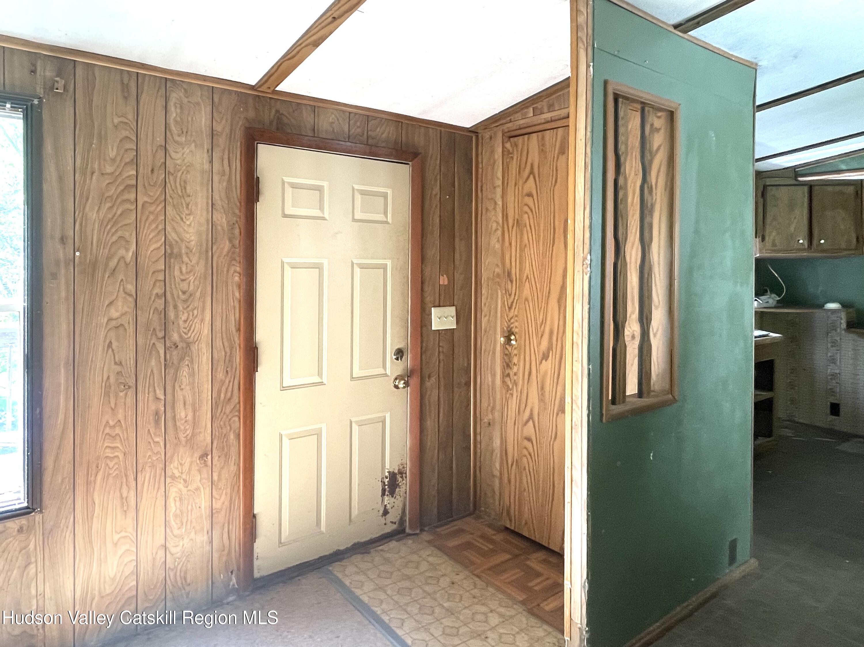 75 Tool House Road Catskill, NY 12414 - Photo 8 of 10 a view of a bathroom with a glass door