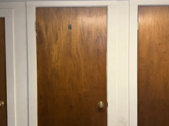 a view of a lake with a yard