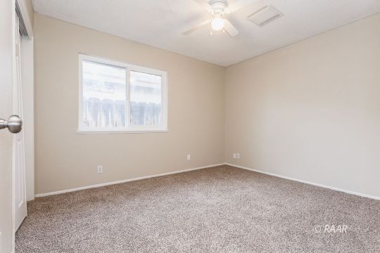 640 Sydnor Avenue Ridgecrest, CA 93555 - Photo 22 of 28 an empty room with a window