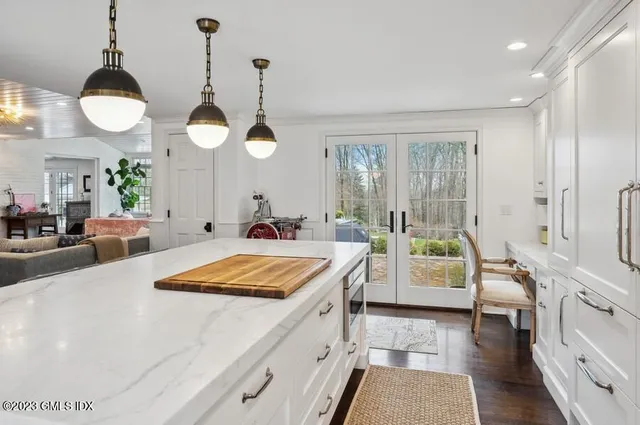 a very nice looking kitchen with a large window