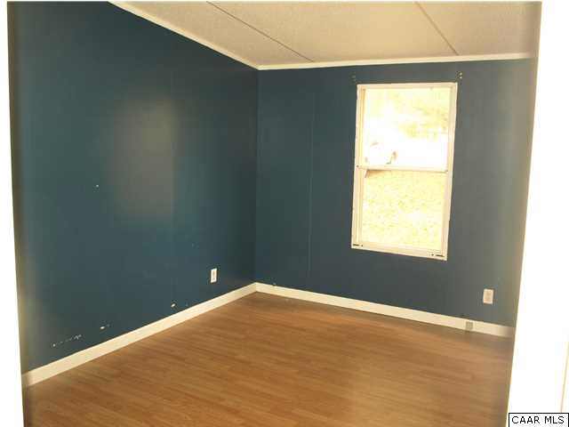 2965 Cedar Lane Road Kents Store, VA 23084 - Photo 12 of 20 a view of an empty room with a window